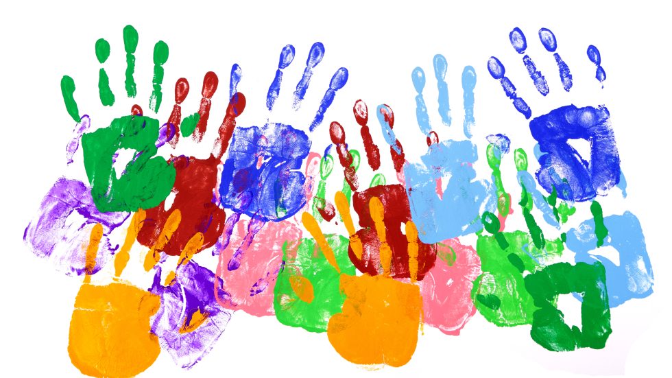 Multicolor handprints on a white background
