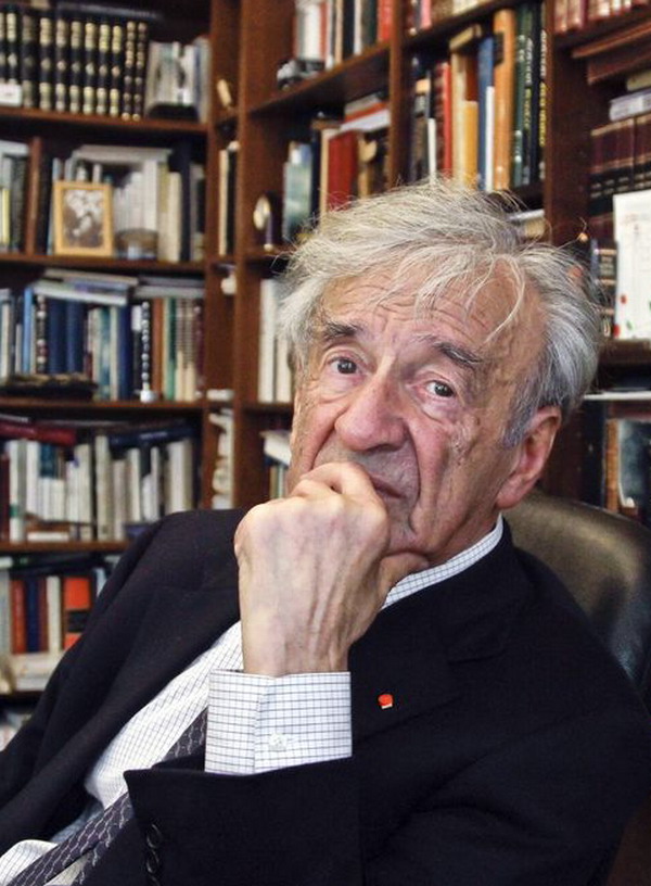 Author and Nobel Laureate Elie Wiesel surrounded by books.