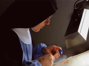 Isola S. Giulio, abbazia “Mater Ecclesiae” UN’ISOLA IMMERSA NEL SILENZIO
