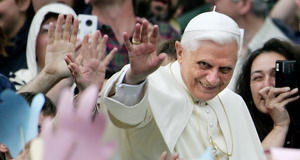 Pope Benedict XVI waves to the pilgrims as he arrives for his weekly general audience on St-Peter's square at the Vatican, 15 June 2005.  The Pope has asked Cardinal Josef Glemp to celebrate in Warsaw on Sunday the beatification of two Polish priests, the Vatican announced Today.AFP PHOTO/ Patrick HERTZOG