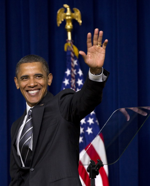 President Barack Obama waves after speaking at the White House Forum on Women and the Economy, Friday, April 6, 2012, in the South Court Auditorium of the Eisenhower Executive Office Building on the White House complex in Washington. (AP Photo/Carolyn Kaster)