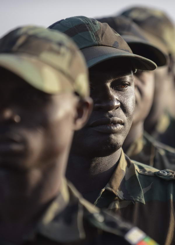 TOPSHOTSTogolese soldiers arrive at the airport on January 17, 2013, in Bamako. Forty Togolese soldiers arrived in Mali today, the first of those pledged by African nations to back a French-led offensive against Islamist rebels. West African troops have promised more than 3,000 soldiers to back Operation Serval, launched on January 11. TOPSHOTS/AFP PHOTO / FRED DUFOUR