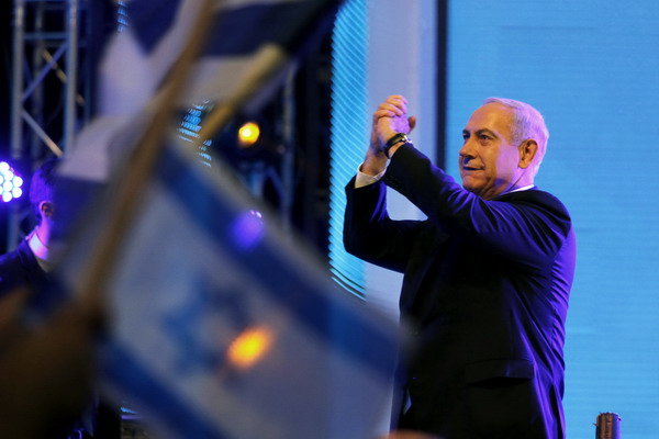 Israeli Prime Minister Benjamin Netanyahu launches the Likud-Beitenu elections campaign on December 25, 2012 in Jerusalem . A month before Israelis go to the polls in a snap election, Prime Minister Benjamin Netanyahu has plenty to be confident about, with his only real challenges coming from within his own rightwing camp. AFP PHOTO/GALI TIBBON