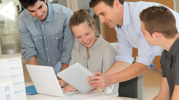 Architectural design students with tablets