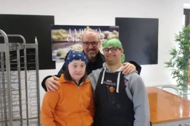 Don Marco Casale e due dei suoi ragazzi