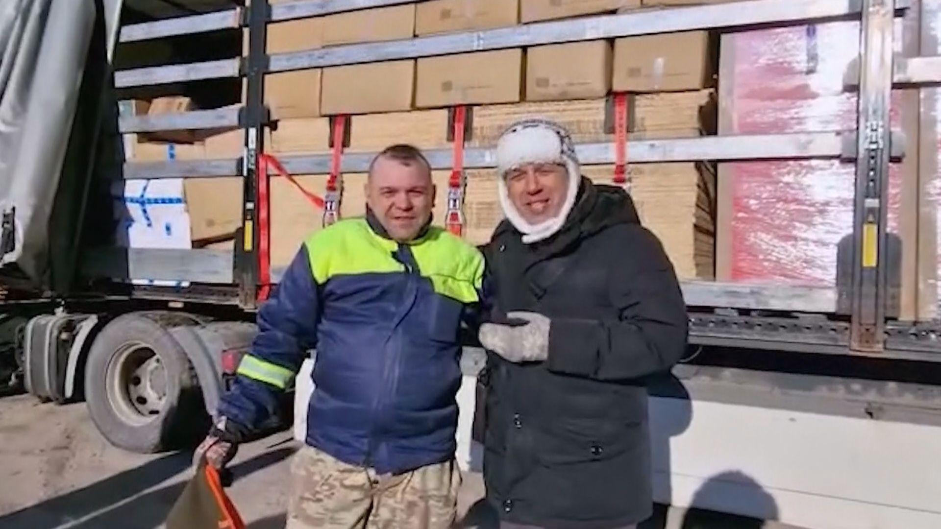 Padre Bovio con un camion di aiuti